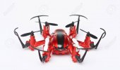 72810776-un-drone-jouet-rouge-isolé-sur-fond-blanc-gros-plan-de-la-vue-de-face-de-drone.jpg