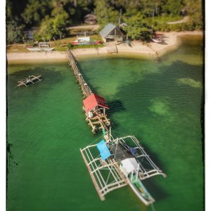 My pier while we load dried coconut for delivery