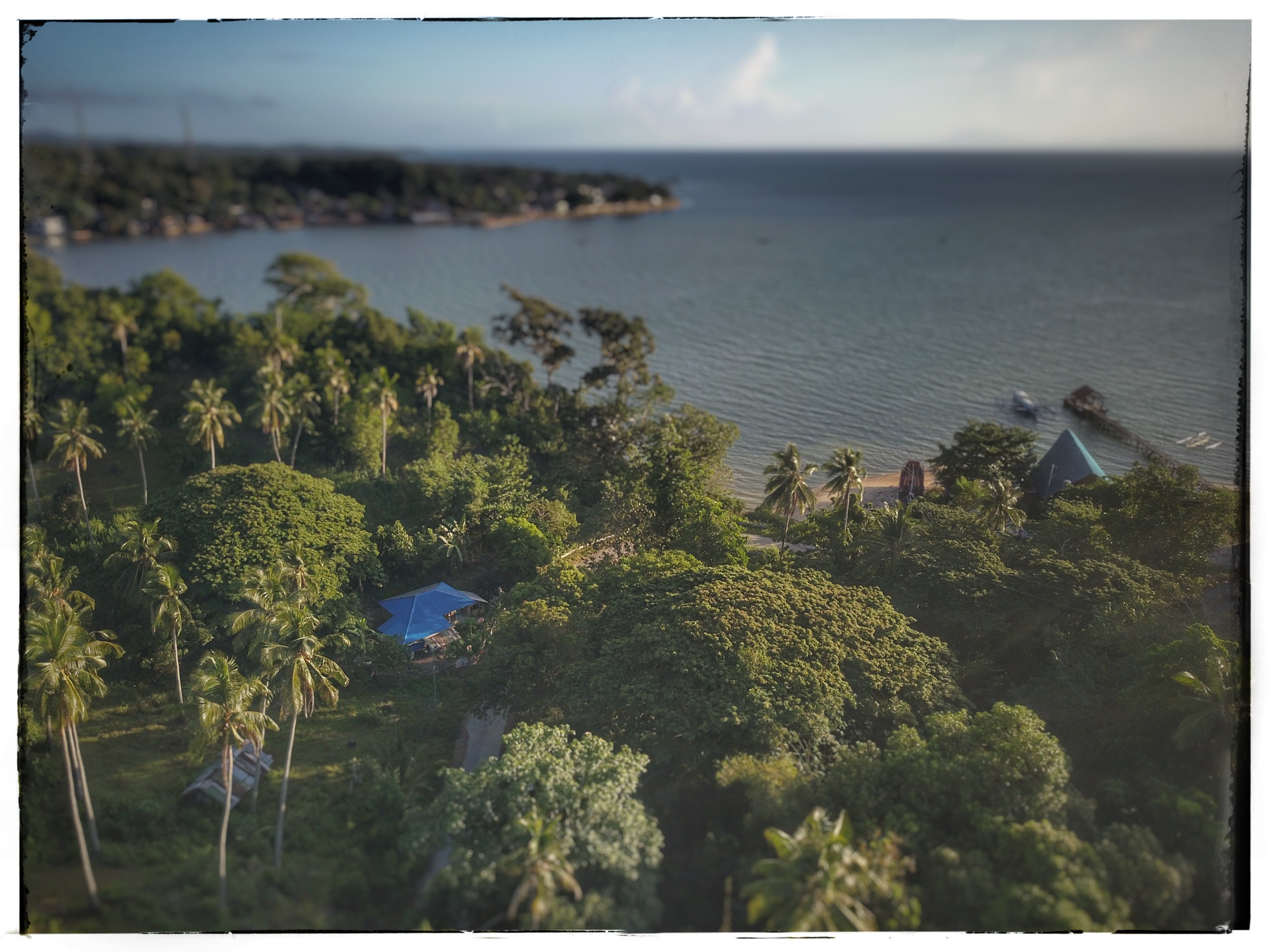 Blue Roof Next to Batuan Bay